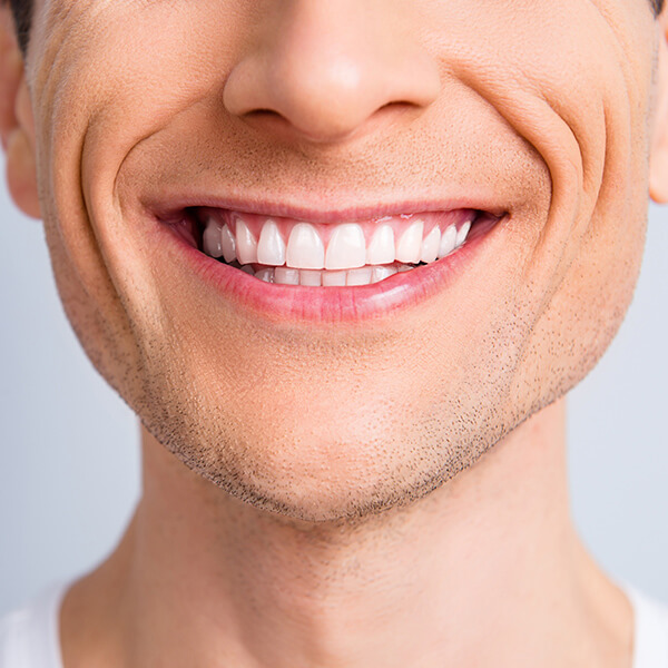 Close-up shot of a man smiling