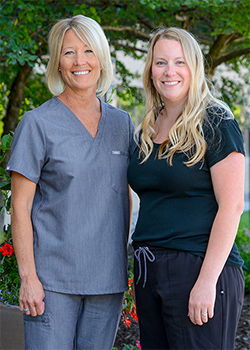 Dr. Jill DuLac with Heather standing outdoors